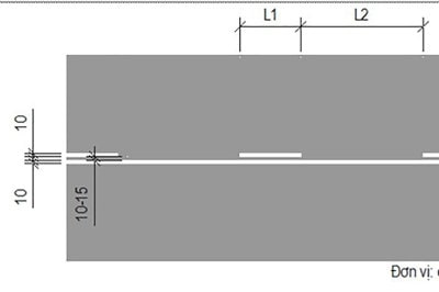 2.4 - Vạch phân chia các làn xe cùng chiều, dạng vạch kép (một vạch liền, một vạch đứt nét)